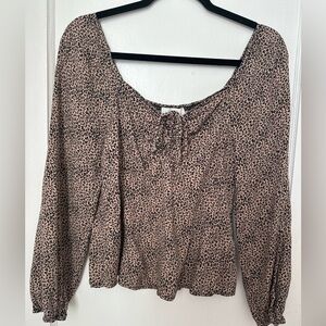 This Urban Romantics blouse in size M. 
Urban Romantics Brown Leopard Print
